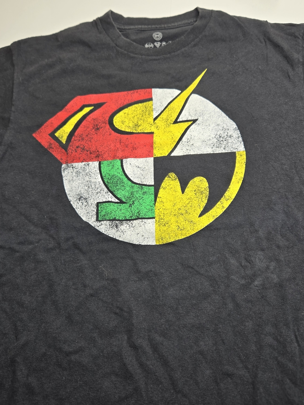 DC Comics Black Short Sleeve Tee with Multicolor Emblem